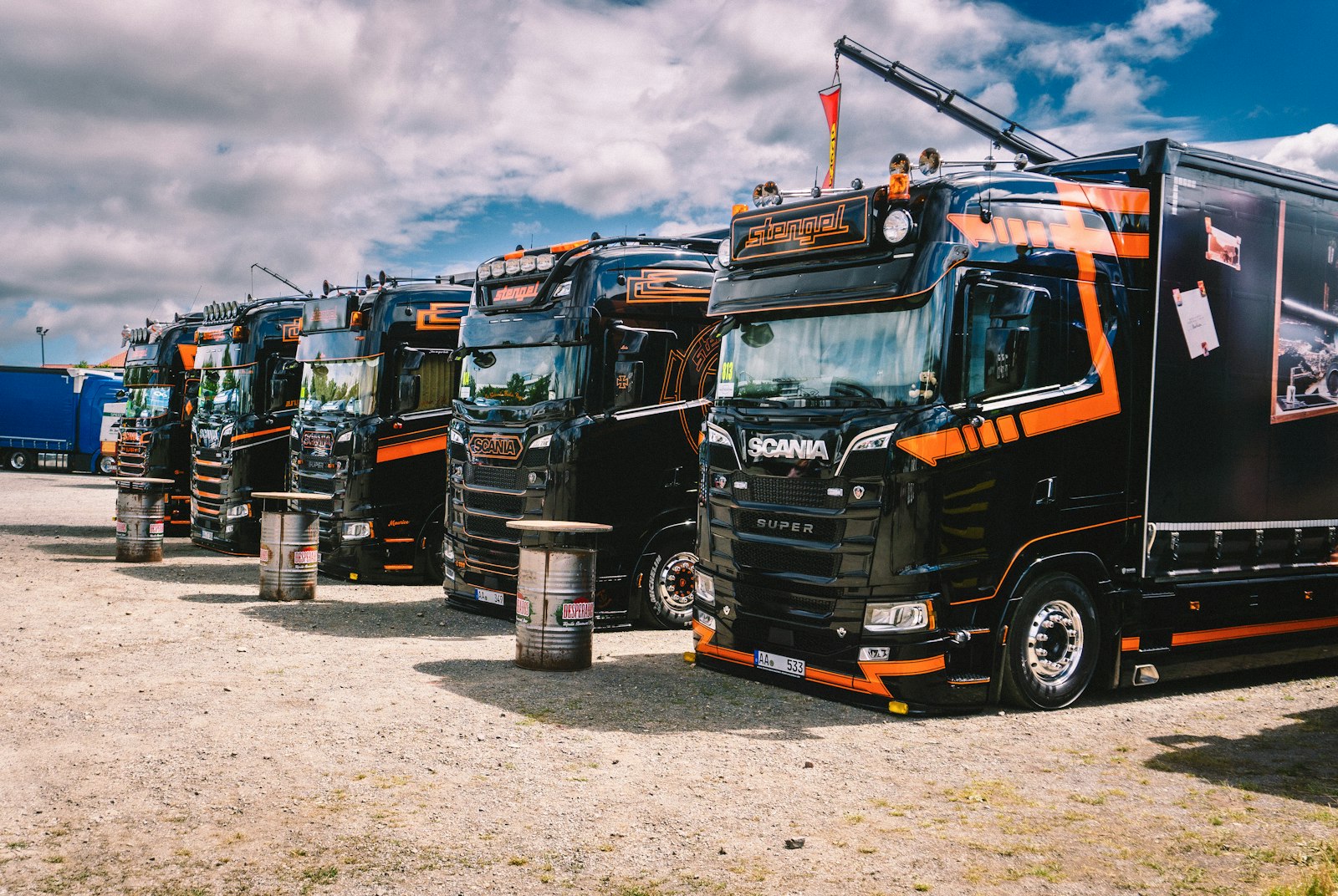 Row of company logistics trucks